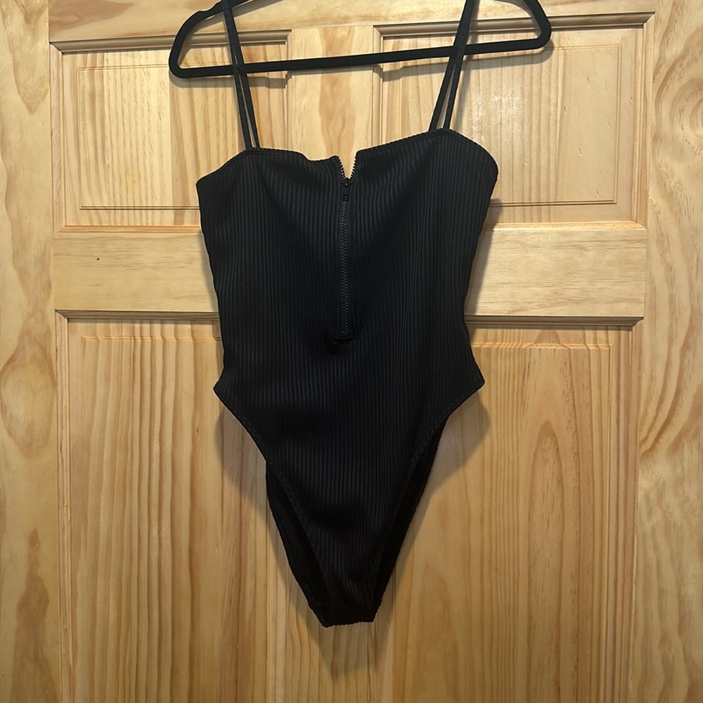 Large black zip up bodysuit